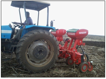 Figure 2: Zero tillage planter with double disk furrow opener.