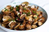 Figure 13: Soy sauce marinated clams (Source: www. foodrepublik.com) In Taiwan, a popular marinated product known as frozen marinated clam is prepared by freezing live clams overnight and then adding soy sauce marinade. These clams can be consumed without heating [55]. Freezing has a specific impact on these clams, as highlighted by Wheaton, et al. Freezing can lead to the breaking or weakening of the bond between the bivalve muscles and the clam’s shell. This structural change during freezing is responsible for the clam shells being opened.