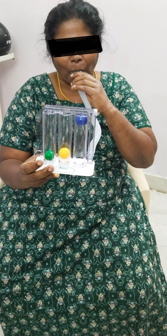 Figure 1: Incentive spirometry was done by the patient in a sitting position.