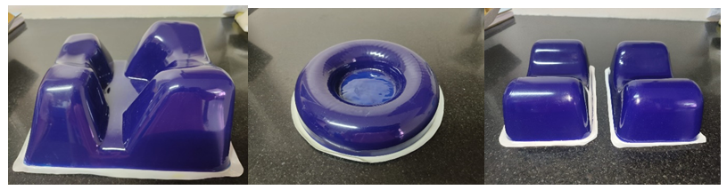 Figure 4: Models of the silicone gel pads for head in prone and supine positions and heel pads.