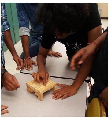 Figure 5: Group project with CNC product and final assembly.