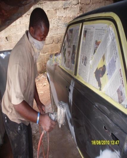 Figure 1: A spray painter using handkerchief.