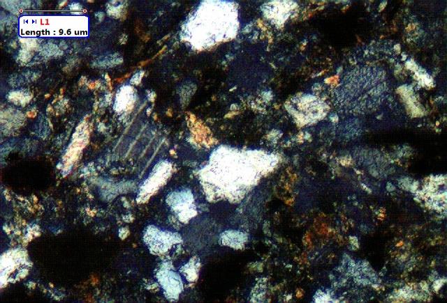 Figure 10: Thin section images of sandstone recovered from NH(B) (depth=3836-3839m) showing the presence of quartz, mica.