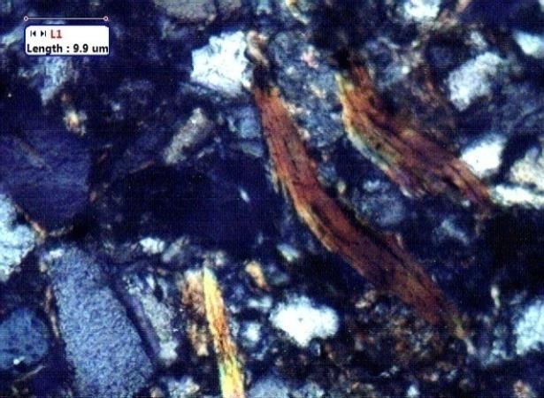 Figure 4: Thin section images of sandstone recovered from BH(A) (depth=3827-3837m) showing the presence of plagioclase feldspar.
