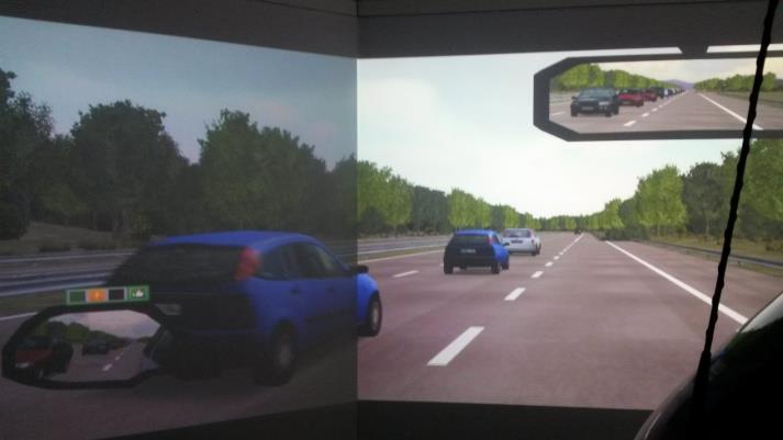 Figure 4: View from the highway entrance scenario. In the overtaking scenario participants were asked to overtake a slowly-moving heavy vehicle on a rural road. The road had one lane per direction with central lane marking. Due to the large size of the lead vehicle, the visibility was limited. In the opposite lane there was a flow of vehicles programmed to drive at 40km/h at a distance of 80m. Given the size and speed of the lead vehicle, the overtaking was practically impossible.