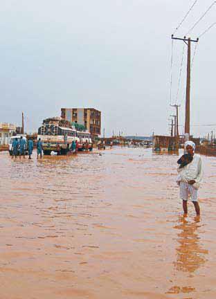 Figure 2: The lack of a storm water drainage system in Khartoum causes major flooding, as observed here in August 2006. As the flood waters recede, pools of stagnant water increase the risk of spreading waterborne diseases, particularly in crowded areas like IDP camps [3].