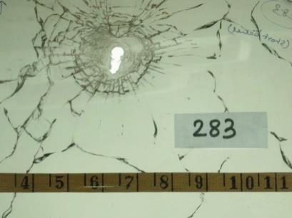 Figure 17: 8mm bullet entry hole. (Close up view)