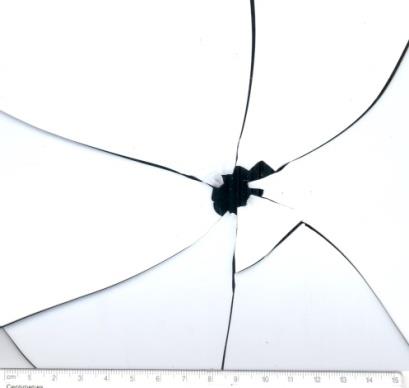 Figure 3: 8mm bullet entry hole 27”. Figure 4: 8mm bullet exit hole 27”.
