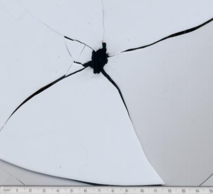 Figure 5: 8mm bullet entry hole 30”. Figure 6: 8mm bullet exit hole 30”.