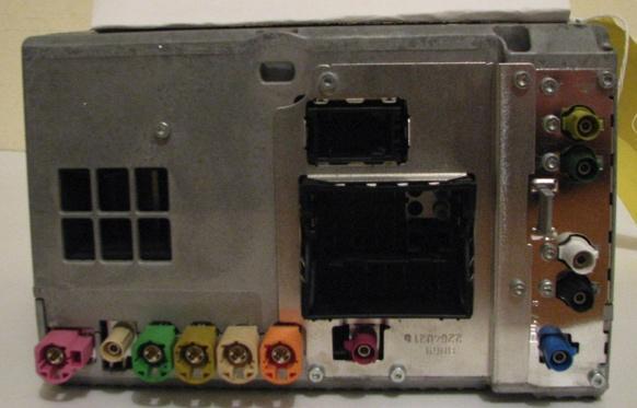 Figure 11: The system’s connection ports at the rear of the unit include an ISO port, and then 12 further unidentified ports. These may offer input for other parts of the vehicle such as antenna, however this cannot be confirmed. Dismantling the device produces a CD/DVD drive and a 200GB Toshiba SATA hard drive. This hard drive contains a label as practitioners would expect, which gives manufacturer and model details. Figure 12, 13.