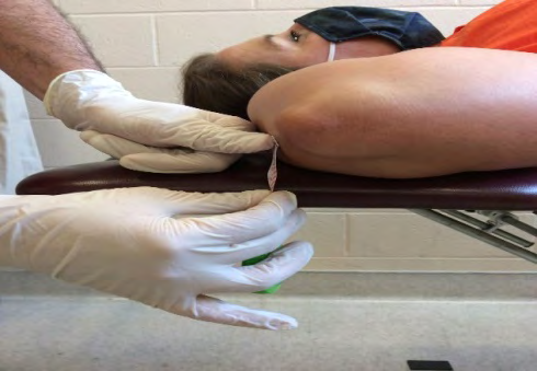 Figure 3: Length testing with a tape measure.