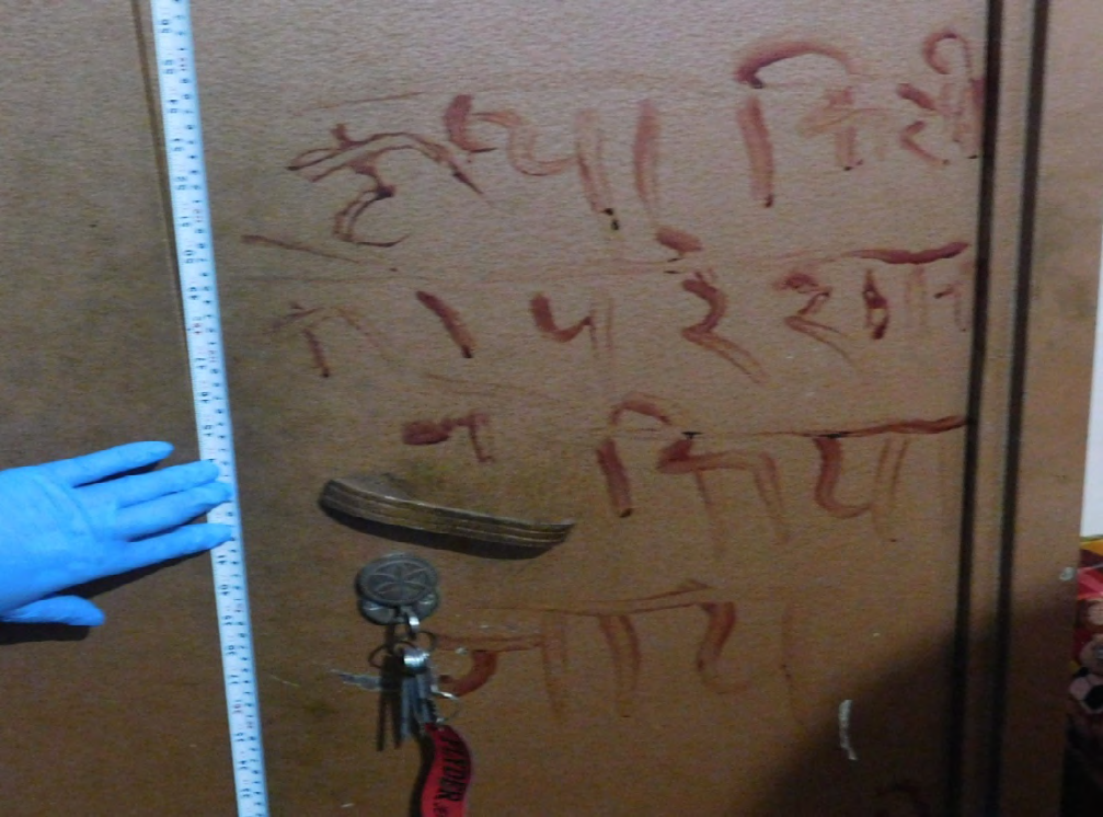 Figure 12: Close view of Suicide note on steel almirah.